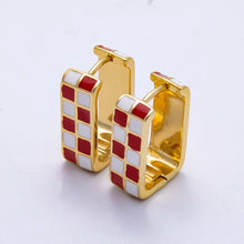 Load image into Gallery viewer, Red and white checkered enamel set on a square shaped huggie earrings