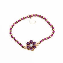 Load image into Gallery viewer, Purple Flower Spinner Bracelet. Featuring a centered figure that actually spins!