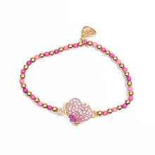 Load image into Gallery viewer, Sparkly Heart Spinner Bracelet. Featuring a centered figure that actually spins!