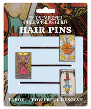 Load image into Gallery viewer, Set of three bobby pins featuring Wheel of Fortune, Justice, and The Hanged Man tarot cards.