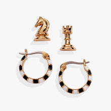 Load image into Gallery viewer, A four-piece gold earring set shown from directly above, displaying a knight stud, a rook stud, and a pair of small black-and-white checkered hoop earrings.