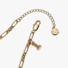 Load image into Gallery viewer, A close-up view of the gold bracelet's lobster claw clasp, extender chain, and circular Alex and Ani logo tag next to a small pawn charm.