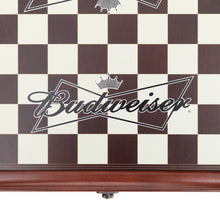 Load image into Gallery viewer, Black Budweiser logo on one side of the chess board, overlayed on brown and white squares