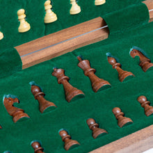 Load image into Gallery viewer, A close-up view of dark carved wooden chess pieces fitted into custom felt-lined storage cutouts inside the open wooden box.