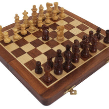 Load image into Gallery viewer, An angled view of an open wooden chessboard filled with light and dark pieces, featuring a brass clasp along the front edge.