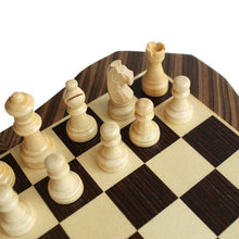Load image into Gallery viewer, A close-up perspective of light-colored carved wooden chess pieces arranged on an inlaid wooden board.
