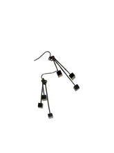 Load image into Gallery viewer, Triple Square Drop Earrings in silver. Solid silver squares hang from thin graduated length wires independent from each other.