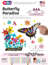 Load image into Gallery viewer, White product packaging for a "Butterfly Paradise" craft kit, featuring bold text at the top and a main scene of a large, black-outlined butterfly with stained-glass-style wings flying above a garden of colorful translucent flowers and a striped caterpillar. The bottom section of the box includes a light pink band showcasing diagrams of the contents—two transparent butterflies and one caterpillar—along with sheets of tiny, multicolored dot stickers used to fill them in.