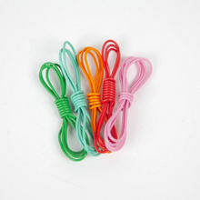 Load image into Gallery viewer, five small bundles of colorful craft string are arranged side-by-side in a neat row. From left to right, the smooth, flexible strings come in vibrant shades of grass green, light teal, bright orange, deep red, and soft pink.