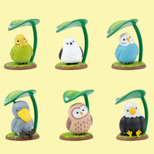 Load image into Gallery viewer, Six small bird figurines neatly arranged in two rows against a soft yellow background.