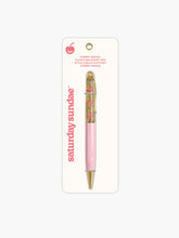 Load image into Gallery viewer, the elegant pen has a soft pink lower barrel, polished gold trim at the tip and clip, and a clear upper chamber filled with sparkling gold glitter fluid where small pink cherry icons float up and down.