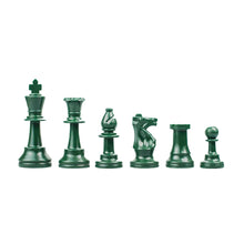 Load image into Gallery viewer, A line of dark army green plastic chess pieces arranged in descending order of height from king to pawn against a white background.