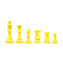 Load image into Gallery viewer, A line of bright yellow plastic chess pieces set against a white background, arranged in height order from king to pawn.
