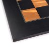 Load image into Gallery viewer, Edge of black olive chess board and pieces