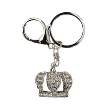 Load image into Gallery viewer, metal keychain featuring a three-dimensional crown charm encrusted with clear rhinestones attached to a split keyring and lobster clasp, shown in silver finish.