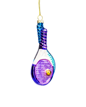Load image into Gallery viewer, A glass ornament shaped like a blue and purple tennis racket with a white frame and a golden ball set into the purple netting.