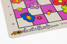 Load image into Gallery viewer, A detail shot of the bottom-left corner of the vinyl chessboard highlighting rank and file letters alongside the artist's signature logo "Charles Houska".