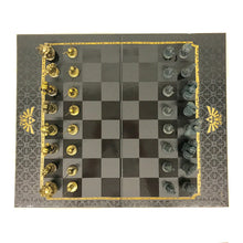 Load image into Gallery viewer, A top-down overhead view of the full Legend of Zelda Chess Set setup, showing both the gold hero and bronze villain character armies positioned in starting formation on the dark checkered board.
