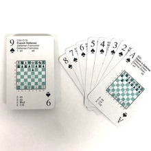 Load image into Gallery viewer, A single 9 of Spades chess playing card for the French Defense placed next to a fanned-out hand of spade cards displaying various chess openings.