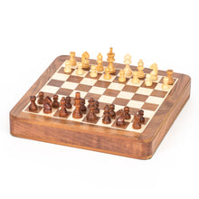 Load image into Gallery viewer, A wooden magnetic chess set with rounded corners and light and dark carved pieces arranged for play on its inlaid checkered surface.