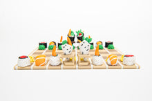 Load image into Gallery viewer, Sushi chess set shown fully set up with white closest to the camera
