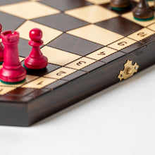 Load image into Gallery viewer, 3-player chess set with its hexagonal board and three distinct sets of wooden pieces, it adds a new layer of strategy
