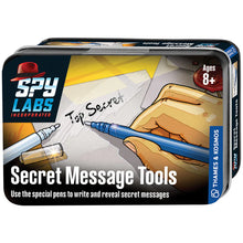 Load image into Gallery viewer, This image shows the front of a small, rectangular storage tin for a children's spy activity kit branded "Spy Labs Incorporated," which is recommended for ages 8 and up. The colorful box features a comic-style illustration of a hand holding a black gadget that shines a beam of blue ultraviolet light onto a brown envelope, revealing a hidden glowing message that reads "Top Secret."
