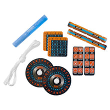 Load image into Gallery viewer, This image shows the loose contents of the secret codes activity kit neatly laid out on a white surface, highlighted by two circular black cipher wheels with spinning alphabet rings in red and blue. Surrounding the wheels are pairs of matching accessories, including small square grid code cards, vertical black signaling cards with orange icons, slender orange decoding strips, a thick blue wax crayon, and a bundled hank of white string.
