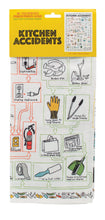 Load image into Gallery viewer, A white cotton dish towel printed with illustrated flowchart diagrams for handling "Kitchen Accidents" is packaged attached to a bright yellow header card.
