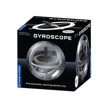 Load image into Gallery viewer, This image shows a cubic black product box labeled "Gyroscope: The essential, spinning physics toy," designed by Thames &amp; Kosmos as part of their Essential STEM Tools line. The front panel features a large circular window showing a metal-and-plastic gyroscope suspended inside a clear, protective plastic sphere, demonstrating how the inner heavy disk spins smoothly on an axis while remaining perfectly balanced.
