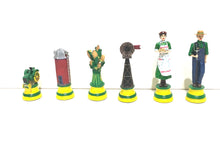 Load image into Gallery viewer, A row of vintage farm chess pieces featuring a tractor, red barn silo, corn stalk bundle, windmill, female farmer holding a pie, and male farmer in overalls with a pitchfork.
