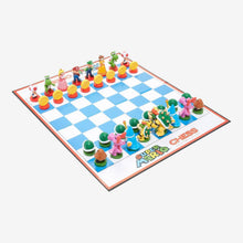 Load image into Gallery viewer, A Super Mario Collector's Edition chess board set up with colorful figurine pieces featuring Mario heroes on one side and Bowser's villains on the other.
