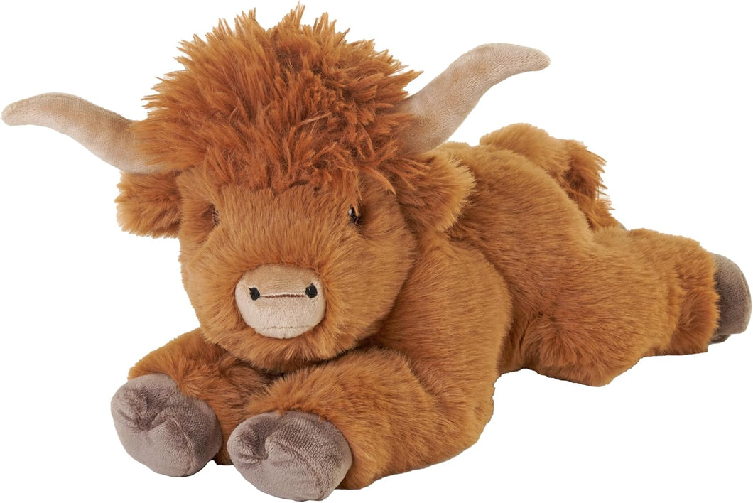 Soft and fluffy plush of a highland cow laying down