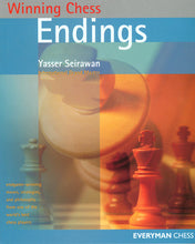 Load image into Gallery viewer, Front cover of the book "Winning Chess Endings" by Yasser Seirawan, featuring a soft-focus close-up of light and dark chess pieces on a board with blue, orange, and clear geometric color blocks overlaying the image.
