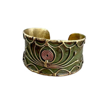 Load image into Gallery viewer, Brass Patina Cuff showcases a stunning contrast of rich, earth-toned green patina and gleaming brass wirework.

