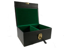Load image into Gallery viewer, An open black leatherette chess storage box with two empty, green felt-lined compartments and a brass key inserted into the front lock.
