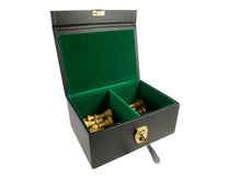 Load image into Gallery viewer, An open black leatherette storage box with green felt-lined compartments containing light and dark wooden chess pieces.
