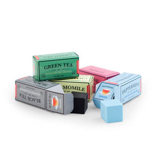 Load image into Gallery viewer, 5 lightly scented erasers in vintage "tea carton" packaging. Scents include green tea, black tea, chamomile, peppermint and jasmine.
