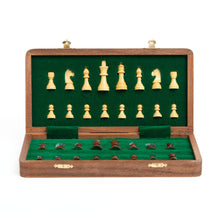 Load image into Gallery viewer, An open wooden folding chess case displaying light and dark wooden pieces neatly secured into individual slots lined with green felt.

