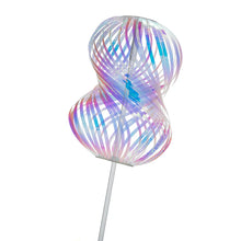 Load image into Gallery viewer, This image showcases the Kikkerland "Mega Rainbow Twirler" toy fully expanded against a plain white background, supported by a thin silver wand extending from below. The toy is composed of numerous thin, flexible ribbons looped together to form a delicate, transparent hourglass shape that shimmers with iridescent pastel shades of pink, purple, and turquoise.
