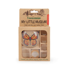 Load image into Gallery viewer, Features 7 compartments and built-in magnifying lenses to take a closer look at your discoveries. 7X (Large), 5X (Medium), and 2X (Small) magnification.
