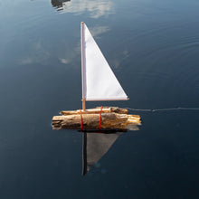 Load image into Gallery viewer, This kit includes everything you need to make your own sailboat, complete with a sail, mast, and rudder.
