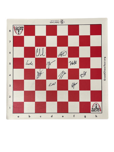 Image of red and whit vinyl board autographed by the players in the 2025 Rapid & Blitz Tournament 