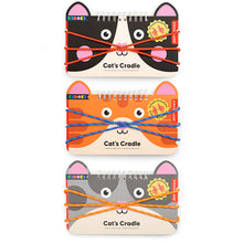 Load image into Gallery viewer, This image displays three cat-shaped, spiral-bound notebooks stacked vertically against a clean white background, each featuring a stylized cartoon cat face with upright ears and wide eyes. From top to bottom, the notebooks depict a black-and-white cat wrapped in orange string, an orange tabby cat wrapped in blue string, and a grey spotted cat wrapped in yellow-orange string to illustrate the classic string game, "Cat's Cradle."
