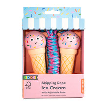 Load image into Gallery viewer, "Skipping Rope Ice Cream" toy set, housed in a pastel pink box adorned with a light blue and white striped awning at the top. Inside the clear display window, two wooden jump rope handles shaped like pink ice cream cones with colorful sprinkles and happy cartoon faces flank a centrally bundled, vibrant blue and pink braided cord.
