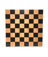 Load image into Gallery viewer, A flat, top-down view of a square wooden chessboard featuring alternating light wood and matte black squares.
