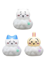 Load image into Gallery viewer, This image shows the exact same three cartoon character figurines—the white bear-like creature (Chiikawa), blue-capped cat (Hachiware), and yellow rabbit (Usagi)—resting on their cloud bases, but shown from a direct front angle under normal white lighting. This perspective highlights their cheerful, blushing facial expressions and the cute pastel stars decorated on the sides of their textured, fluffy clouds.
