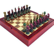 Load image into Gallery viewer, A complete themed chess set displayed on a raised wooden board, featuring aquatic-themed pieces opposing fiery fantasy-themed pieces.
