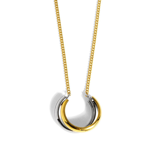 image of intwined gold and silver open hoop necklace