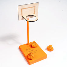 Load image into Gallery viewer, Sticky notes turn into basketballs when crumpled. Includes a pencil stand and mini basketball hoop for interactive fun.
